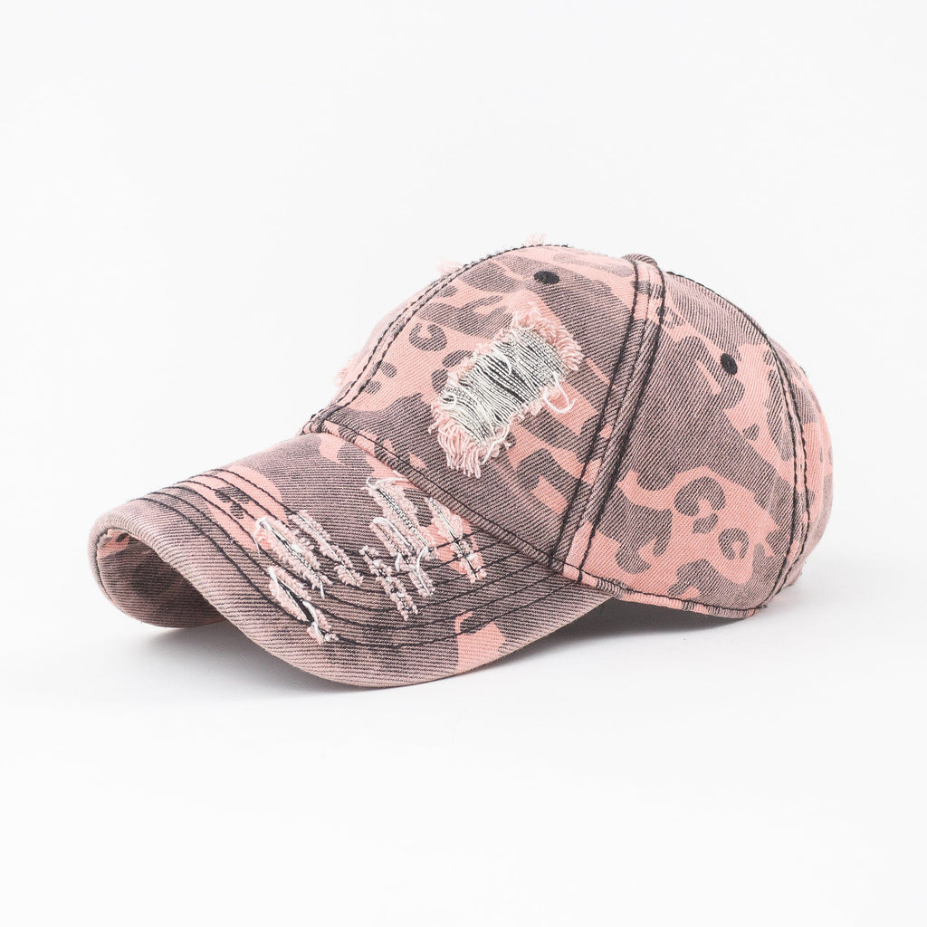 Pink camouflage baseball cap on a white background