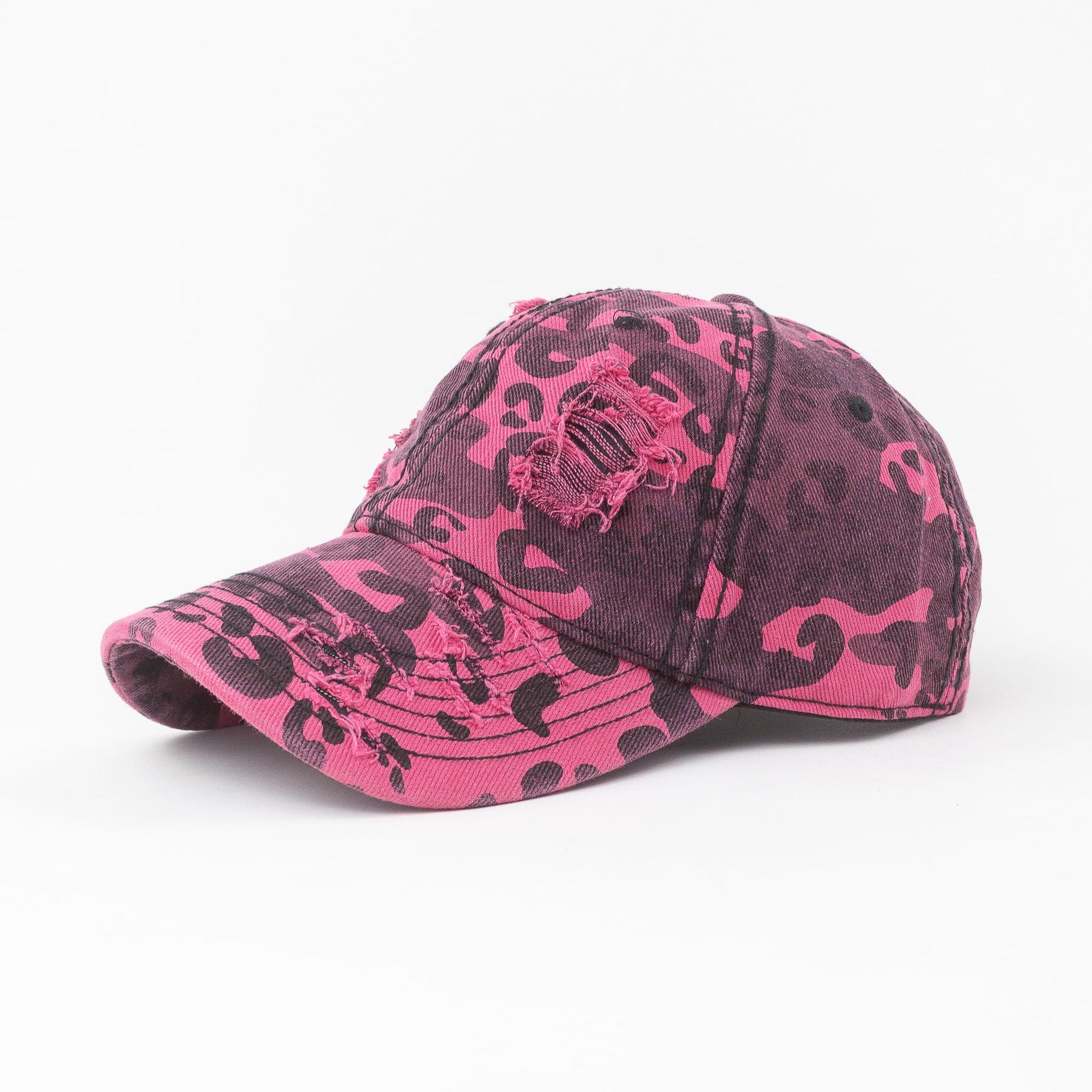 Pink and black camouflage baseball cap on a white background